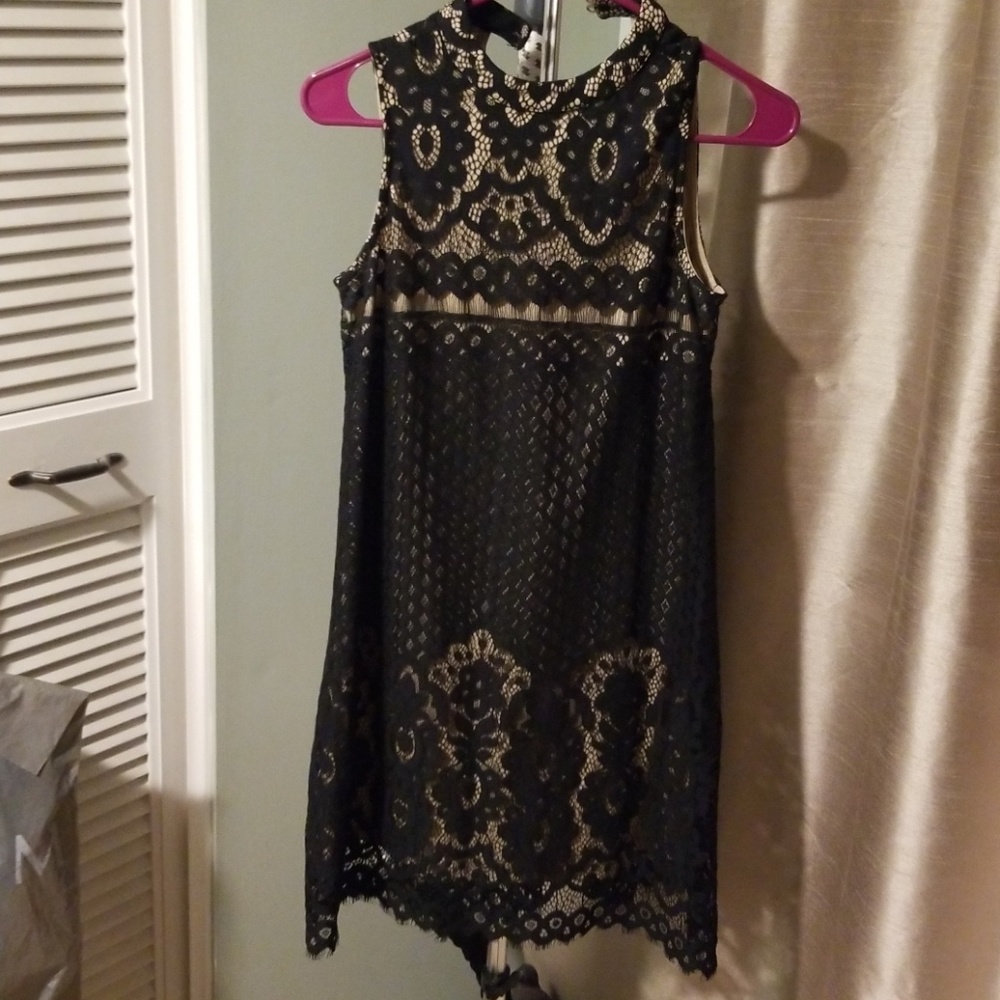 Short black sleeveless dress never worn